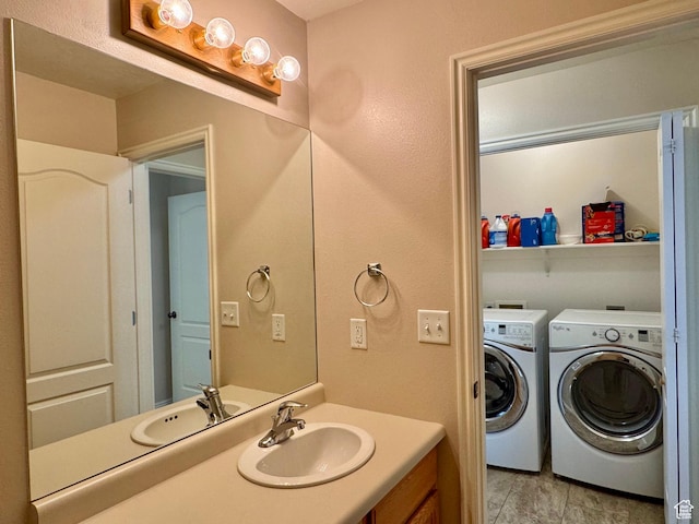 445 Topaz Blvd Unit 10, Delta, UT 84624 - bathroom featuring washer and dryer and vanity