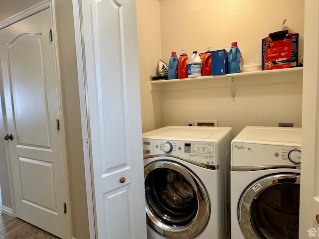 445 Topaz Blvd Unit 10, Delta, UT 84624 - laundry area featuring washing machine and clothes dryer and wood finished floors