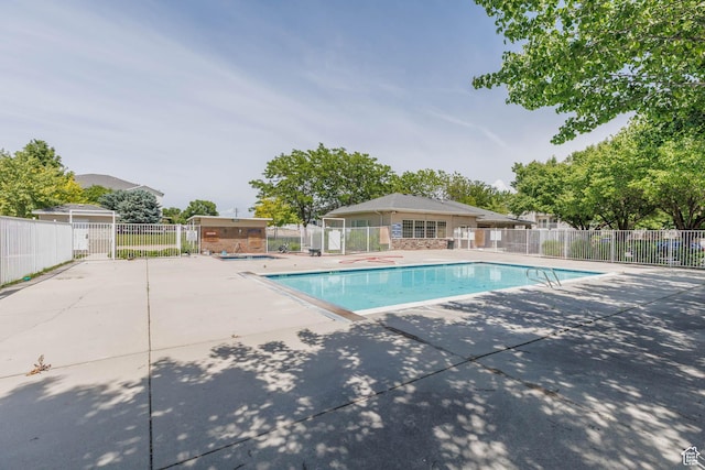 3760 S Carlisle Park Pl Unit 1, Salt Lake City, UT 84119 - community pool featuring a patio