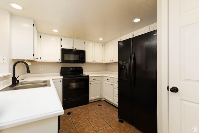 3760 S Carlisle Park Pl Unit 1, Salt Lake City, UT 84119 - kitchen featuring black appliances, a sink, dark tile patterned floors, recessed lighting, and light countertops