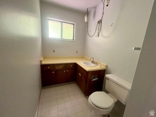 160 E 300 S, Gunnison, UT 84634 - half bathroom featuring vanity and tile patterned floors
