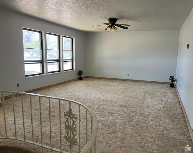 160 E 300 S, Gunnison, UT 84634 - spare room featuring ceiling fan, carpet, and a textured ceiling