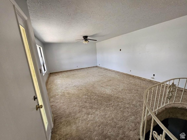 160 E 300 S, Gunnison, UT 84634 - unfurnished room featuring ceiling fan, carpet floors, and a textured ceiling