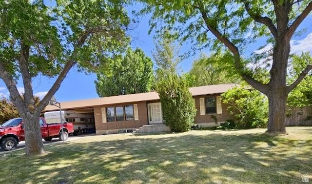 160 E 300 S, Gunnison, UT 84634 - ranch-style house with a front lawn
