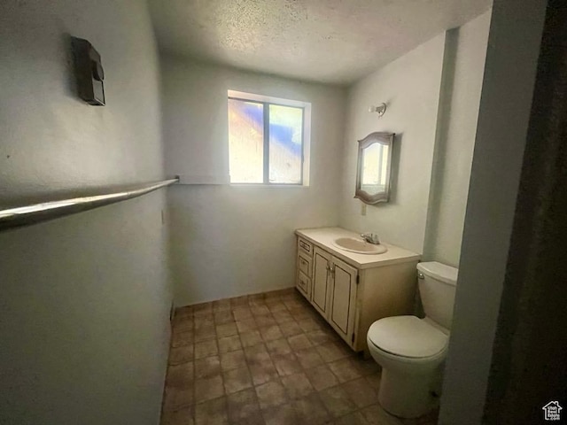 160 E 300 S, Gunnison, UT 84634 - bathroom featuring vanity and a textured ceiling