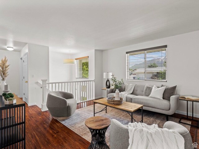 9750 S David St E, Sandy, UT 84070 - living room with wood finished floors and baseboards
