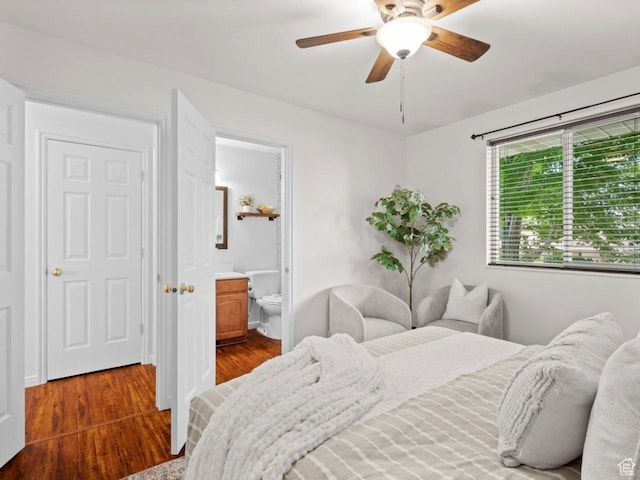 9750 S David St E, Sandy, UT 84070 - bedroom featuring dark wood-style floors, connected bathroom, and a ceiling fan