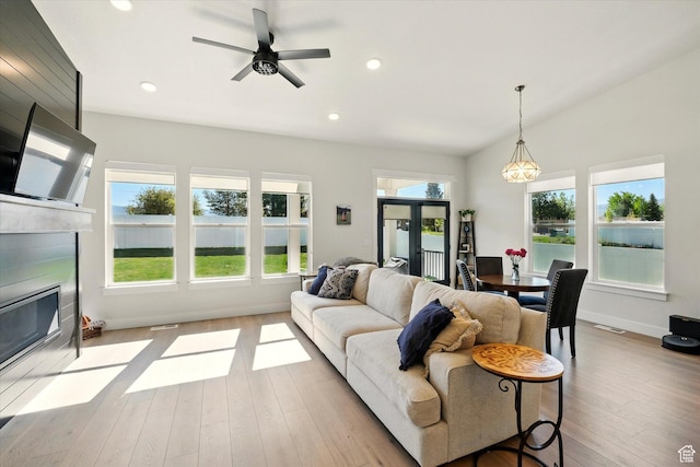 1335 S 1140 E, Heber City, UT 84032 - living room with a fireplace with flush hearth, wood finished floors, recessed lighting, ceiling fan, and baseboards