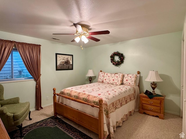 786 E Bristlecone Dr, Delta, UT 84624 - bedroom featuring light carpet, baseboards, and a ceiling fan