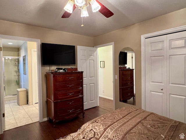 786 E Bristlecone Dr, Delta, UT 84624 - bedroom with dark wood finished floors, arched walkways, baseboards, a closet, and a ceiling fan