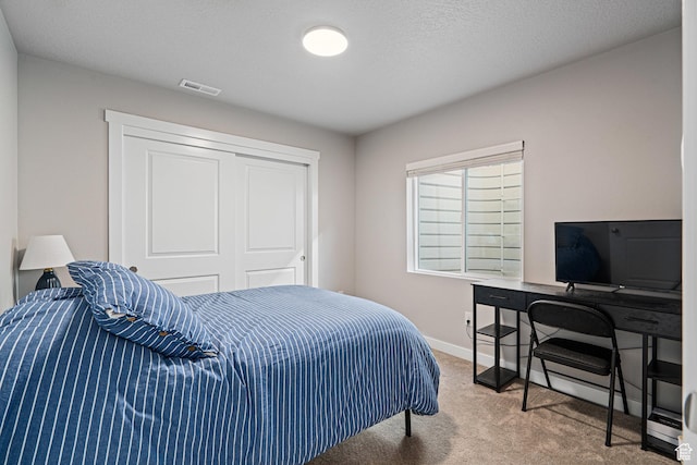 9857 N Featherstone Dr, Highland, UT 84003 - carpeted bedroom featuring a closet, baseboards, and a desk