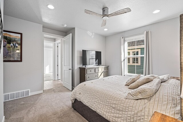9857 N Featherstone Dr, Highland, UT 84003 - carpeted bedroom with a textured ceiling, ceiling fan, baseboards, and recessed lighting