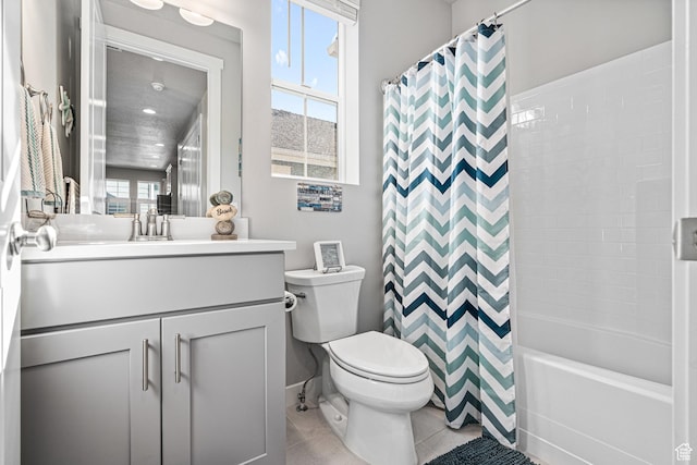 9857 N Featherstone Dr, Highland, UT 84003 - full bathroom with toilet, vanity, shower / bathtub combination with curtain, tile patterned floors, and baseboards