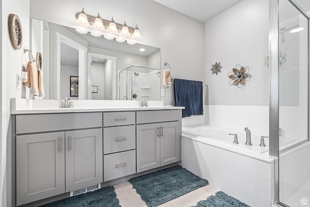 9857 N Featherstone Dr, Highland, UT 84003 - bathroom with a stall shower, double vanity, a garden tub, and tile patterned flooring