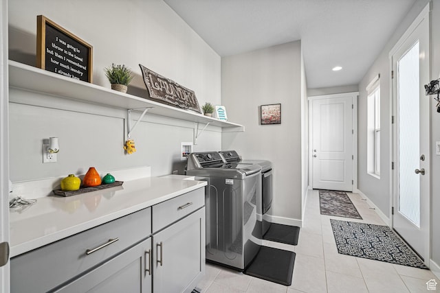 9857 N Featherstone Dr, Highland, UT 84003 - laundry area with washer and clothes dryer, baseboards, recessed lighting, and light tile patterned floors
