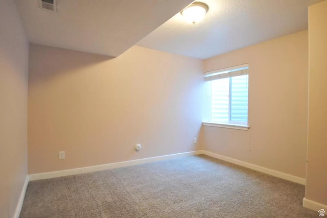 1035 N 130 W Unit 100, Logan, UT 84341 - carpeted spare room featuring baseboards