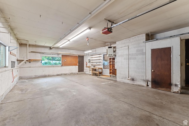 700 E Spruce Glen Rd, Murray, UT 84107 - garage featuring a garage door opener