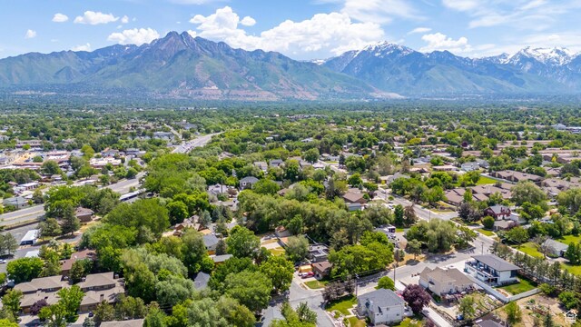 700 E Spruce Glen Rd, Murray, UT 84107 - aerial perspective of suburban area featuring a mountainous background