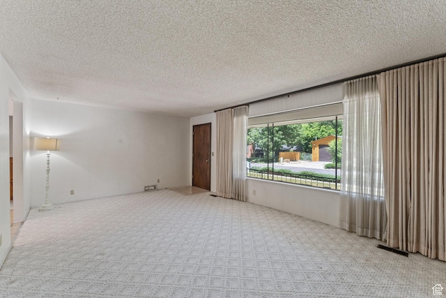 700 E Spruce Glen Rd, Murray, UT 84107 - empty room with carpet and a textured ceiling