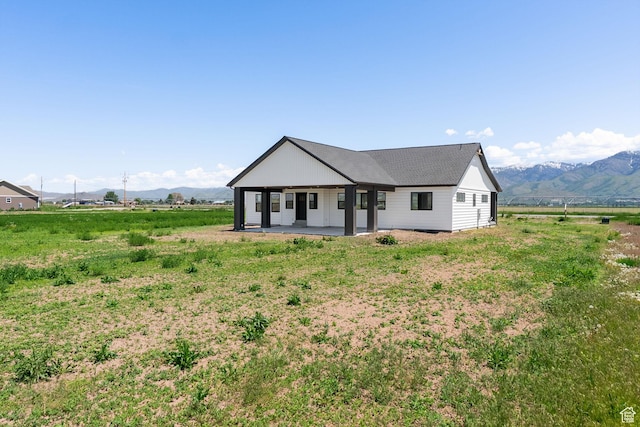1120 S 800 W, Lewiston, UT 84320 - modern farmhouse featuring a mountain view, a patio area, and a view of rural / pastoral area