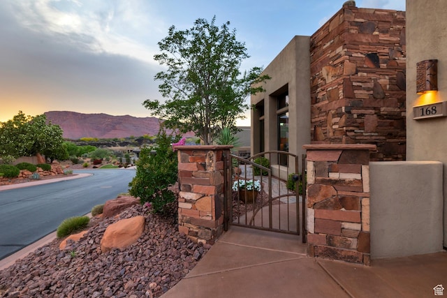 3052 N Snow Canyon Pwky Unit 168, St George, UT 84770 - exterior space featuring a gate and a mountain view