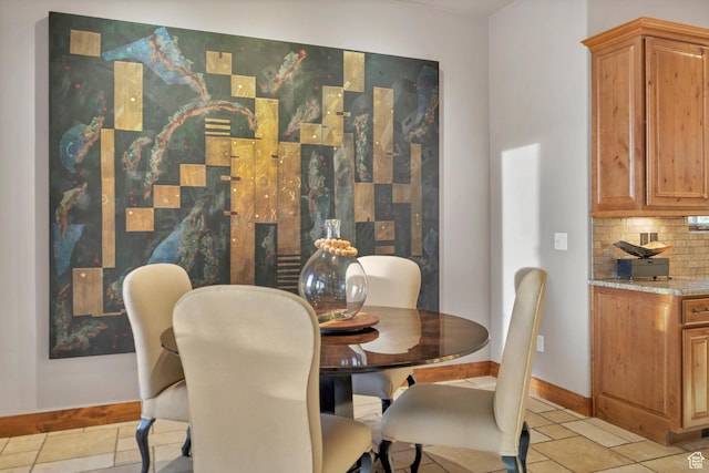 3052 N Snow Canyon Pwky Unit 168, St George, UT 84770 - dining area with baseboards and light tile patterned flooring