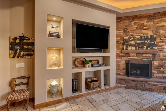 3052 N Snow Canyon Pwky Unit 168, St George, UT 84770 - living area featuring built in shelves and a stone fireplace