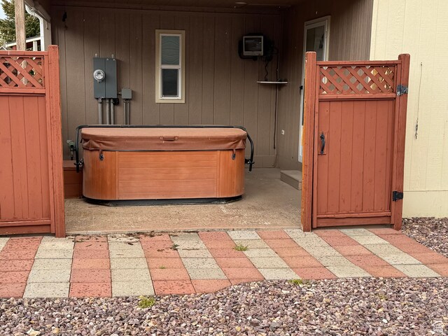 235 N 5th E, Manila, UT 84046 - view of patio / terrace featuring a hot tub and a gate