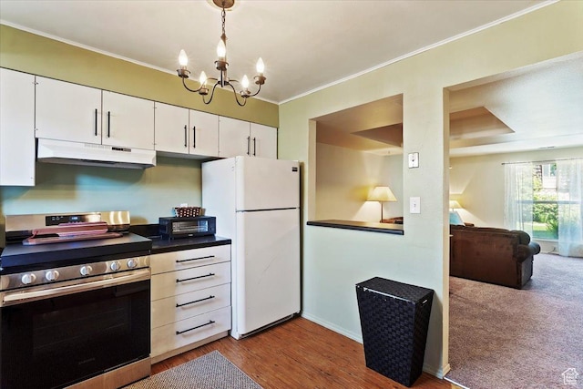 88 W 50 S Unit H7, Centerville, UT 84014 - kitchen featuring stainless steel electric range, under cabinet range hood, freestanding refrigerator, a chandelier, and white cabinets