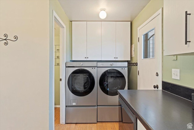 88 W 50 S Unit H7, Centerville, UT 84014 - washroom featuring cabinet space, washing machine and clothes dryer, and light wood-type flooring