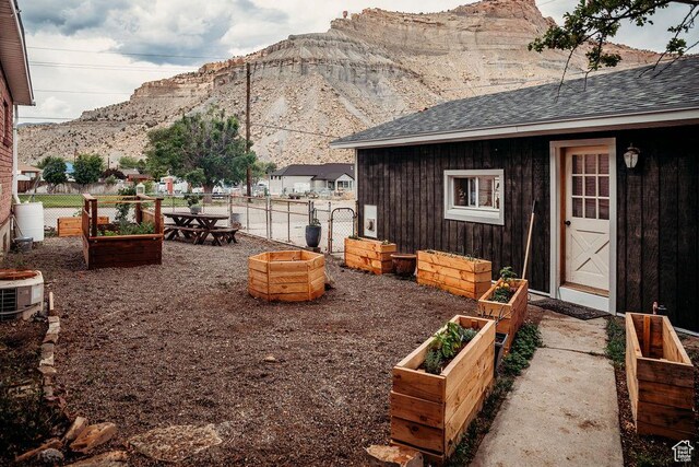 1 S 3rd Ave, Helper, UT 84526 - view of yard with a vegetable garden and a mountain view