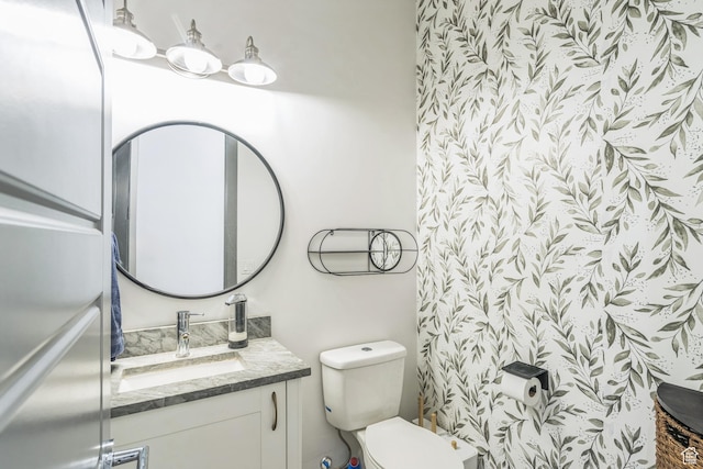 1186 W Marinwood Ave, Murray, UT 84123 - half bathroom featuring vanity and toilet