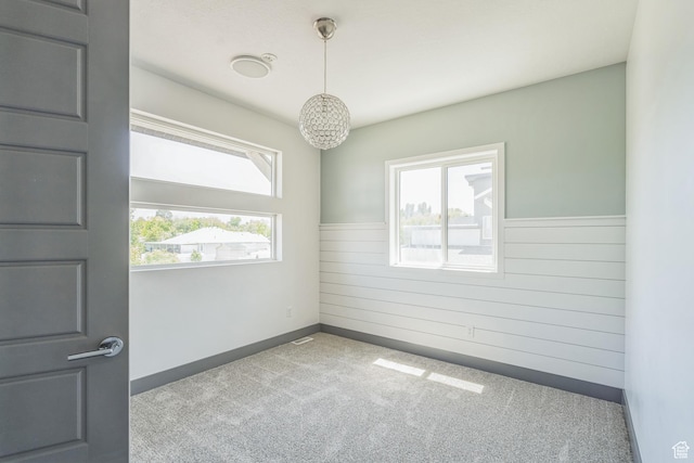 1186 W Marinwood Ave, Murray, UT 84123 - carpeted spare room with wooden walls, wainscoting, and baseboards