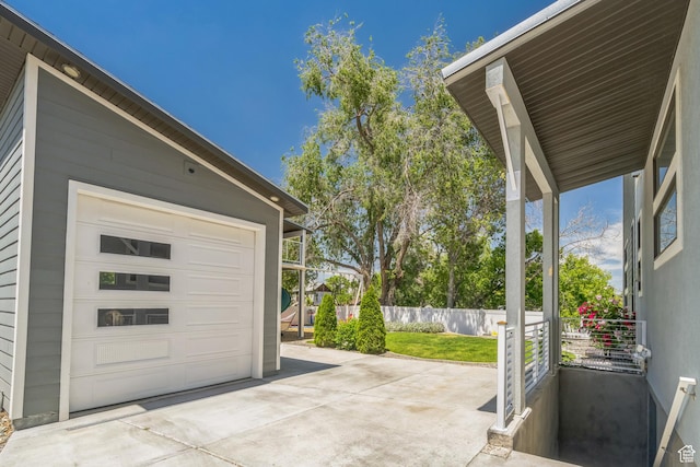 1186 W Marinwood Ave, Murray, UT 84123 - garage with concrete driveway