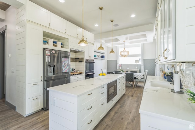 1186 W Marinwood Ave, Murray, UT 84123 - kitchen with appliances with stainless steel finishes, wood finished floors, a center island, open shelves, and white cabinets