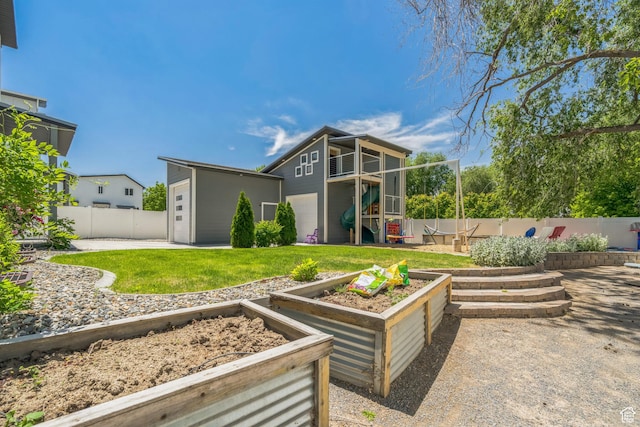 1186 W Marinwood Ave, Murray, UT 84123 - back of property featuring a vegetable garden and an outbuilding