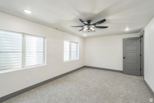 1186 W Marinwood Ave, Murray, UT 84123 - unfurnished room with light carpet, ceiling fan, recessed lighting, and baseboards