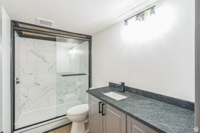 1186 W Marinwood Ave, Murray, UT 84123 - bathroom with toilet, vanity, a stall shower, and wood finished floors