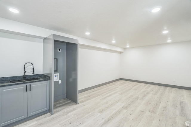1186 W Marinwood Ave, Murray, UT 84123 - bar area with a sink, light wood-type flooring, recessed lighting, and baseboards