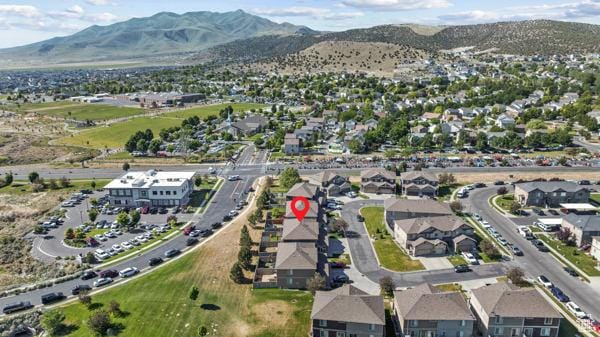8064 N Clearwater Rd, Eagle Mountain, UT 84005 - view of property location with a mountainous background and nearby suburban area