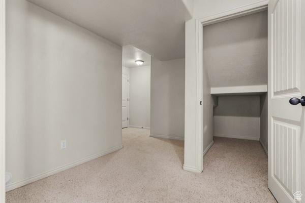8064 N Clearwater Rd, Eagle Mountain, UT 84005 - corridor with light carpet and baseboards