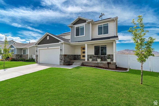 182 W Braeburn Ln, Santaquin, UT 84655 - craftsman house with a porch, stone siding, board and batten siding, a garage, and concrete driveway