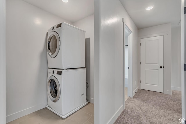 182 W Braeburn Ln, Santaquin, UT 84655 - laundry area with stacked washer and clothes dryer, baseboards, and recessed lighting