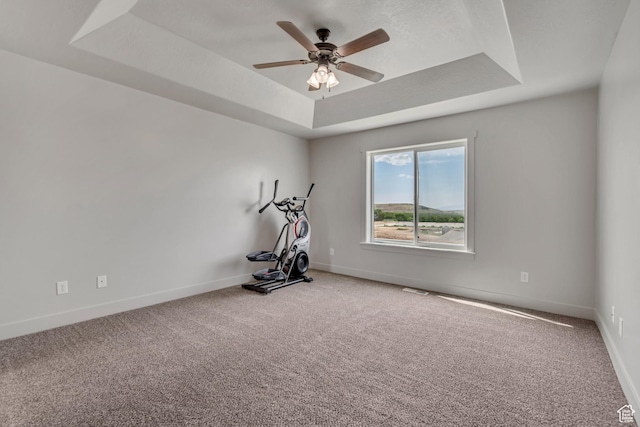 182 W Braeburn Ln, Santaquin, UT 84655 - exercise room with a raised ceiling, ceiling fan, carpet floors, and baseboards