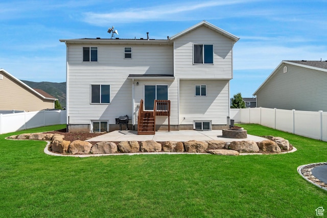 182 W Braeburn Ln, Santaquin, UT 84655 - back of property with a fire pit and a patio area