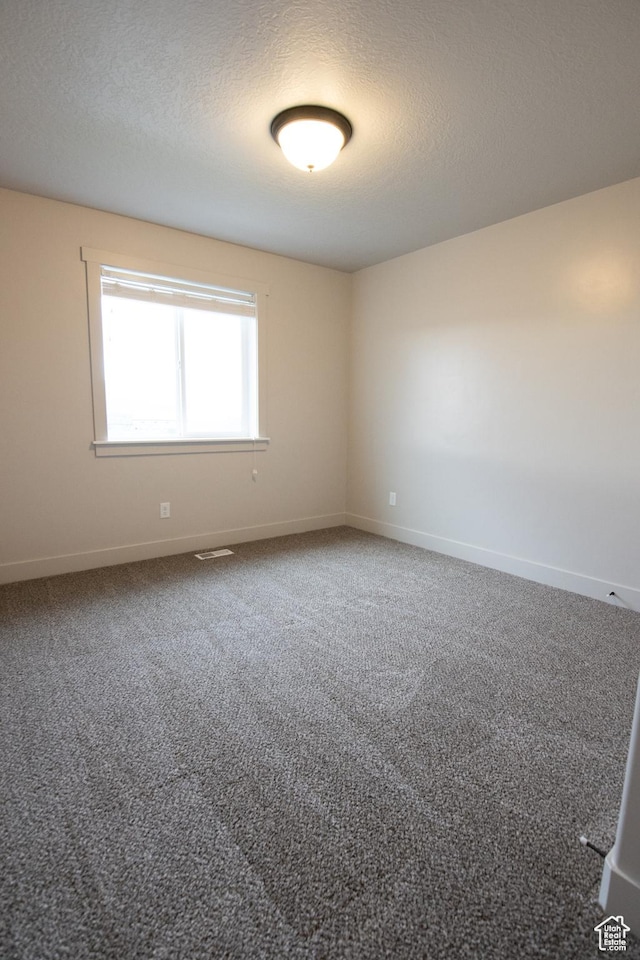 182 W Braeburn Ln, Santaquin, UT 84655 - carpeted empty room with baseboards and a textured ceiling