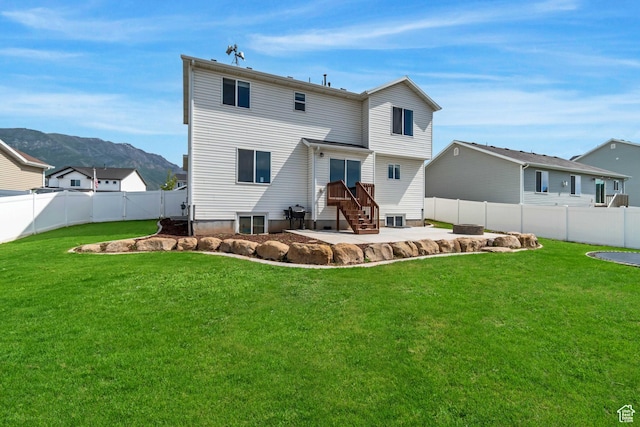 182 W Braeburn Ln, Santaquin, UT 84655 - rear view of house with a mountain view and a patio