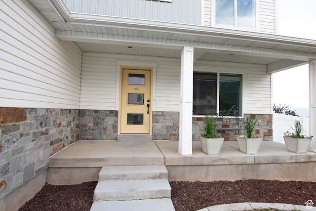 182 W Braeburn Ln, Santaquin, UT 84655 - view of exterior entry with a porch and stone siding