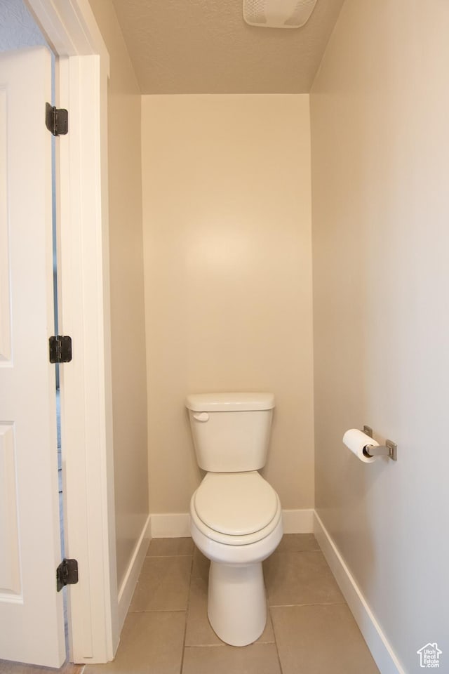 182 W Braeburn Ln, Santaquin, UT 84655 - bathroom with baseboards, toilet, and tile patterned floors