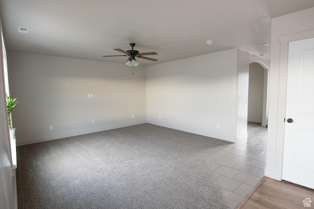 182 W Braeburn Ln, Santaquin, UT 84655 - unfurnished room with ceiling fan, arched walkways, and baseboards